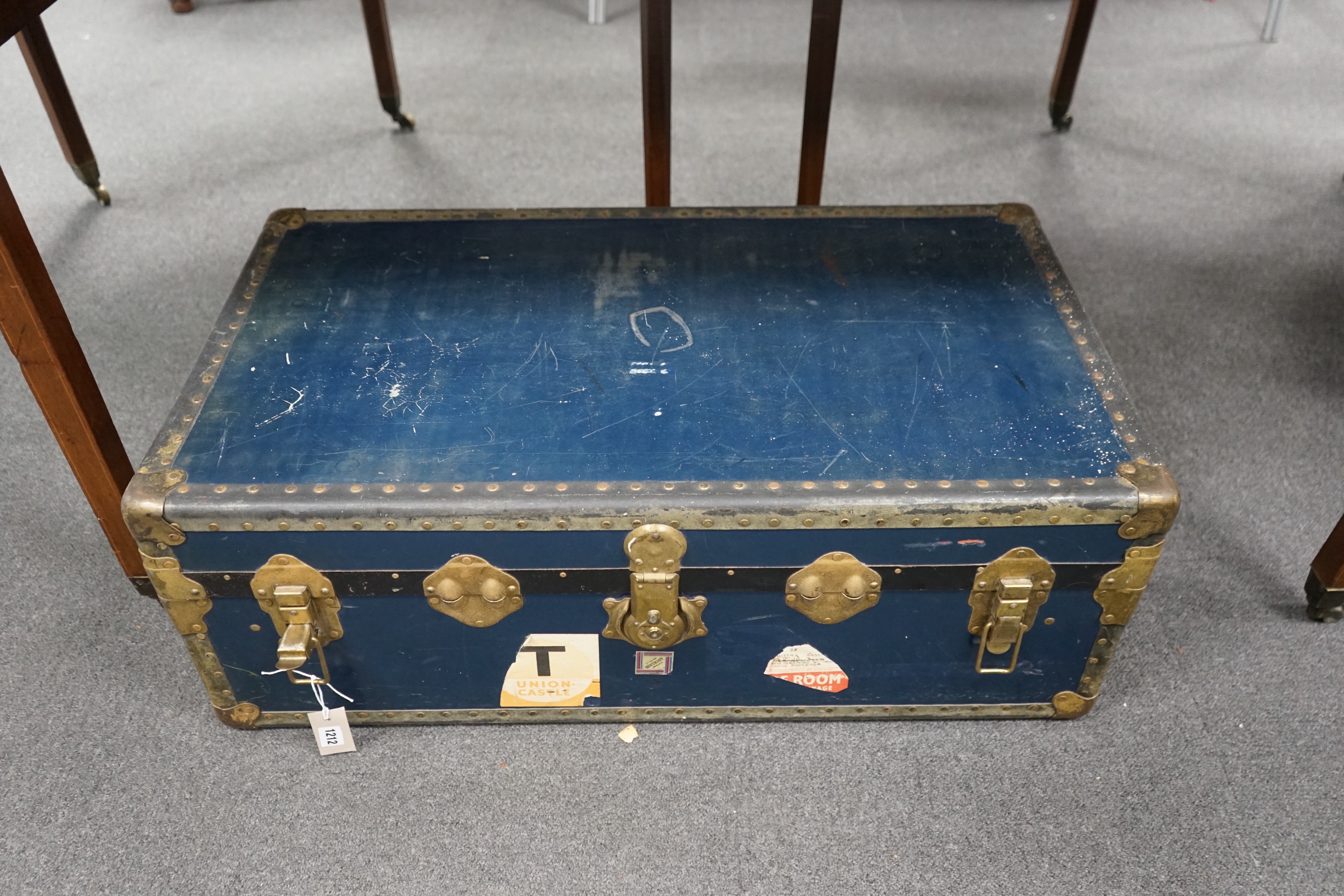 A vintage brass bound travelling trunk, length 91cm, depth 51cm, height 33cm